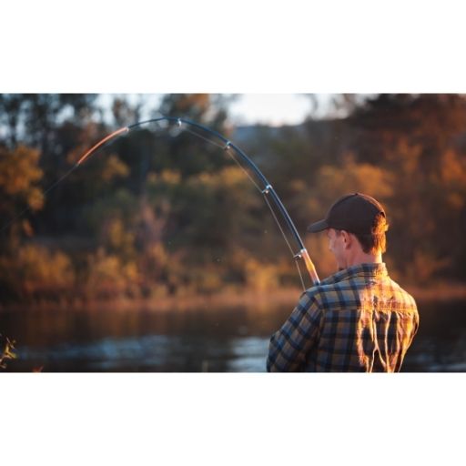 Angler catching a trout at Lake Eildon